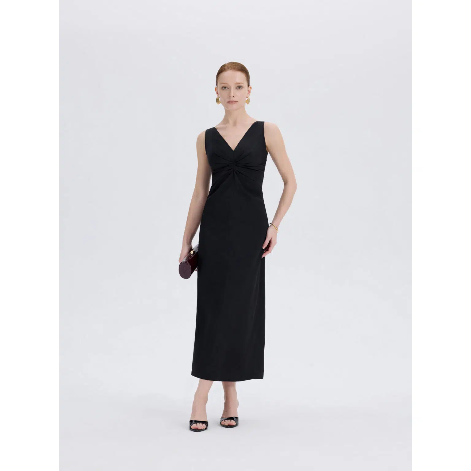 Minimalist fast fashion women's apparel black dress inspired by ZARA at Ousph