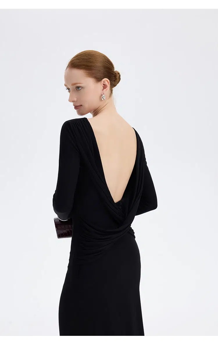 Black twist back maxi dress back view open back twist knot detail at Ousph