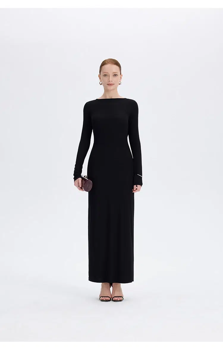 Black twist back maxi dress full front view standing pose at Ousph