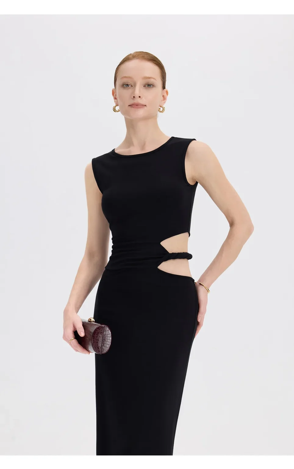 ousph black cutout maxi dress standing front