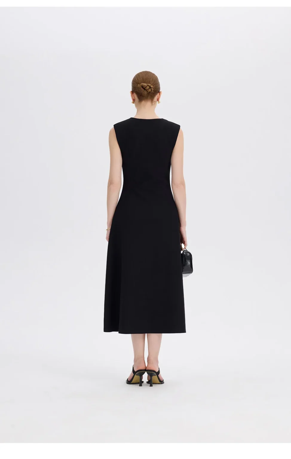 ousph black midi dress standing front