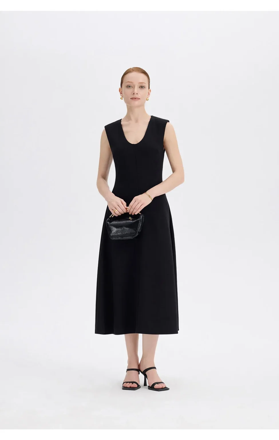 ousph black midi dress standing front