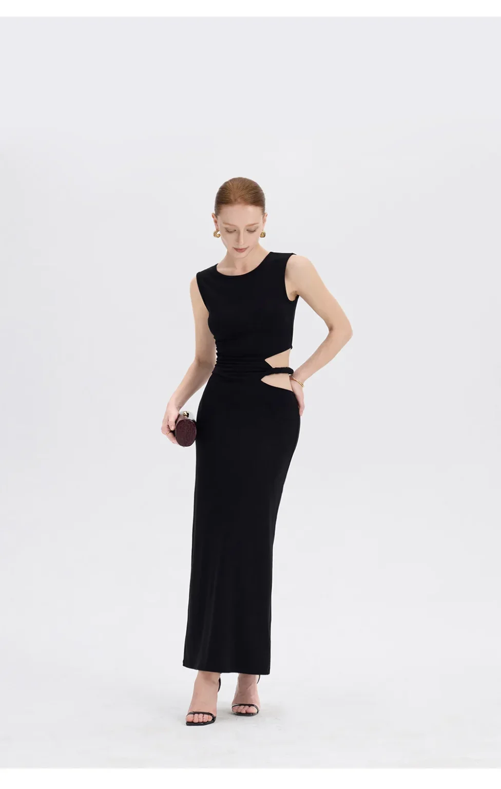 ousph black cutout maxi dress walking side view